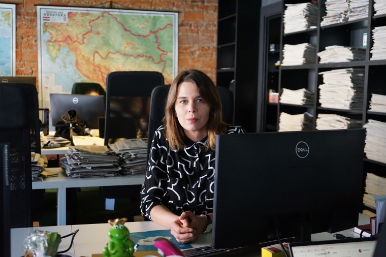 Croatian journalist Melita Vrsaljko at work in the offices of Faktograf prior to being attacked in her home on July 16.