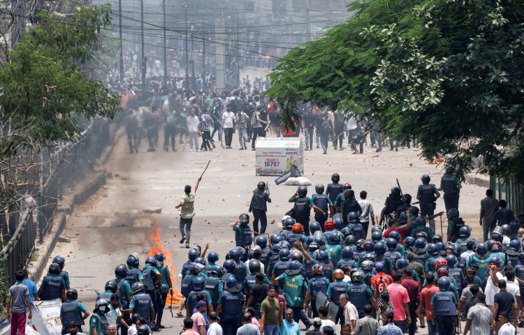 Anti-quota protesters clash with police and supporters of the ruling Awami League supporters in the Rampura area of Dhaka, Bangladesh, on July 18, 2024. At least three journalists have been killed covering the protests. (Reuters/Mohammad Ponir Hossain)