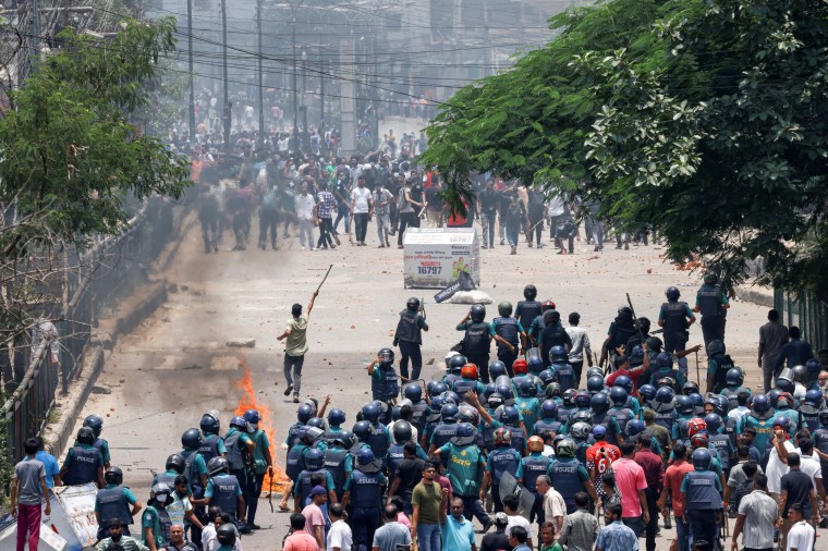 Anti-quota protesters clash with police and supporters of the ruling Awami League supporters in the Rampura area of Dhaka, Bangladesh, on July 18, 2024. At least three journalists have been killed covering the protests. (Reuters/Mohammad Ponir Hossain)