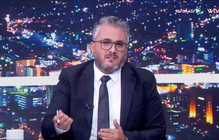 Libyan journalist Ahmed al-Sanussi speaking on Wasat TV.