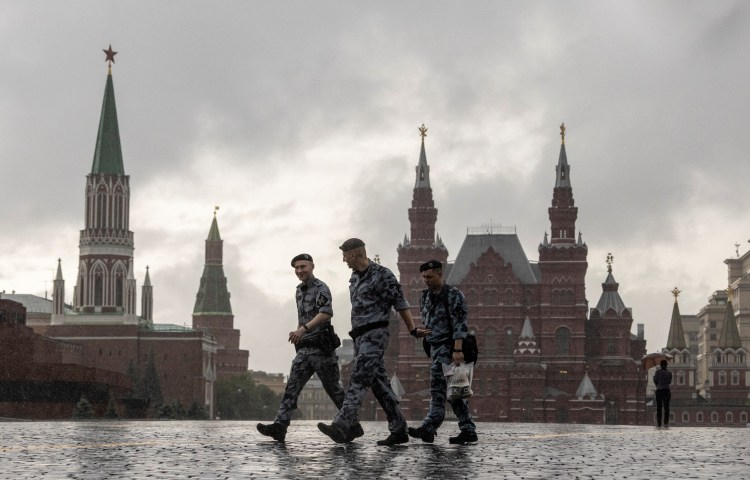 Russian law enforcement officers walk in the Red Square during stormy weather in Moscow on June 20, 2024. (Photo: Reuters/Maxim Shemetov)