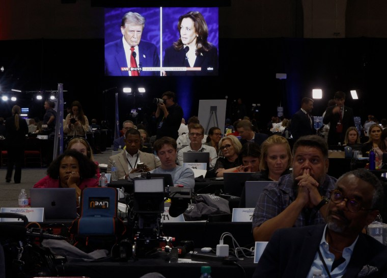 Journalists watch the televised debate between Republican presidential candidate Donald Trump and Democratic candidate Kamala Harris in Philadelphia on September 10, 2024. (Photo: Reuters/Evelyn Hockstein)