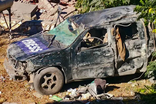 A car marked "Press" sits among the wreckage after an Israeli airstrike that hit a compound housing 18 journalists in southern Lebanon on October 24, 2024, killing three journalists and injuring three. (Photo: AFP)