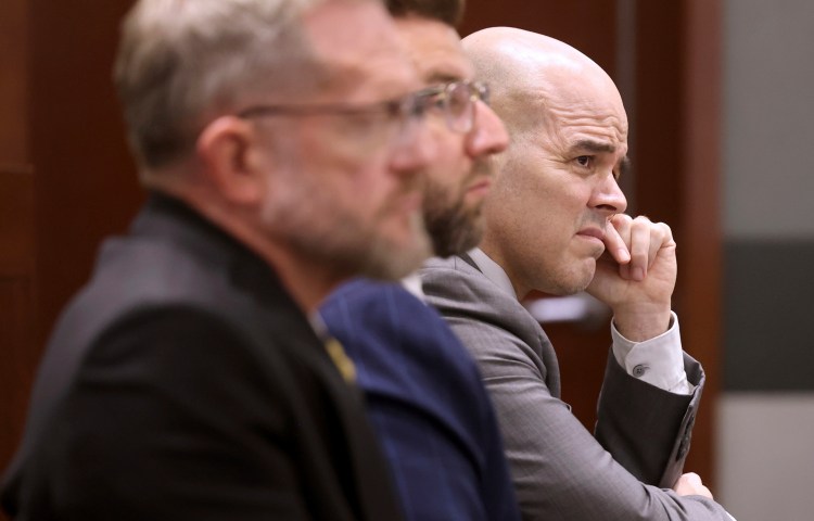 In this file image, Robert Telles (right), a former Clark County public administrator charged in the murder of investigative journalist Jeff German, listens to closing arguments during his murder trial in Las Vegas, on August 26, 2024.