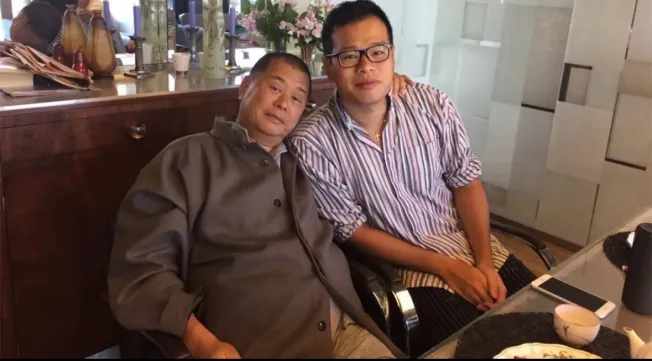 Imprisoned Hong Kong media publisher Jimmy Lai with his son Sebastien in an undated photo.