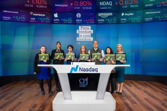 Sebastien Lai (third from right) campaigns for his father Jimmy Lai's release with his international legal team and the Committee to Protect Journalists staff during World Press Freedom Day at the Nasdaq MarketSite in New York City in May 2023.