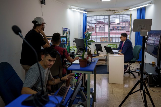 Exiled Nicaraguan journalists report on their home country from San Jose, Costa Rica in 2022. Human rights and journalists' groups have reported that press freedom is almost nonexistent in Nicaragua. (Photo: AP/Moises Castillo)