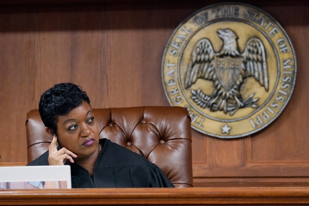FILE - Hinds County Chancery Judge Crystal Wise Martin listens to lawyer Rob McDuff, an attorney for Parents For Public Schools, during a hearing in Jackson, Miss., Aug. 23, 2022. (AP Photo/Rogelio V. Solis, File)