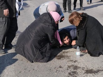 Slemani News Network camera operator Sivar Baban struggles to breathe after being teargassed during a Kurdistan teachers’ protest on February 9.