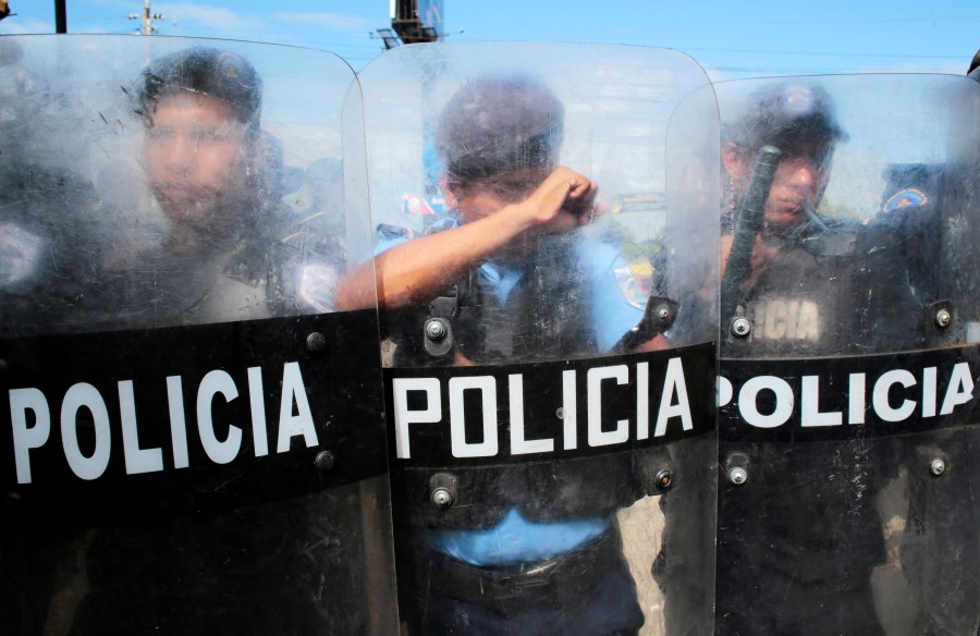 Riot police stand guard during the commemoration of International Human Rights Day in Managua, Nicaragua December 10, 2019.REUTERS/Oswaldo Rivas