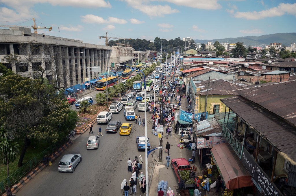 FILE - Traffic and pedestrians fill a street in Addis Ababa, Ethiopia, Nov. 3, 2022.