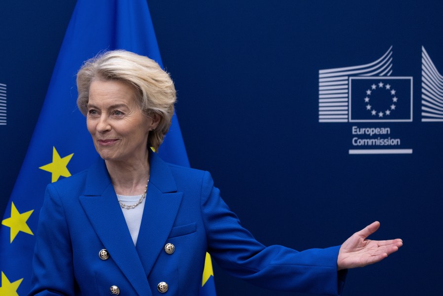 A woman in a blue suit.