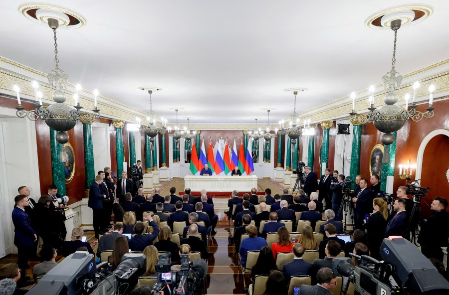Officials and journalists attend a press conference of Belarus' President Alexsandr Lukashenko and Russia's President Vladimir Putin in Moscow on March 13, 2025. Belarus has been jailing an increasing number of journalists since 2020, after Lukashenko's disputed reelection. (Photo: AFP-Pool/Maxim Shemetov)