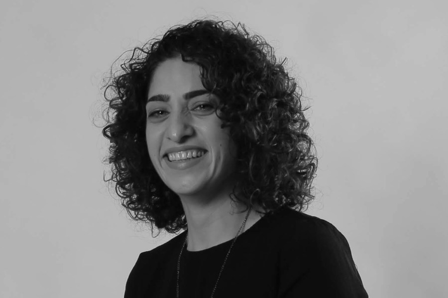 Black and white portrait of Sara Qudah, new Regional Director for the Middle East and North Africa