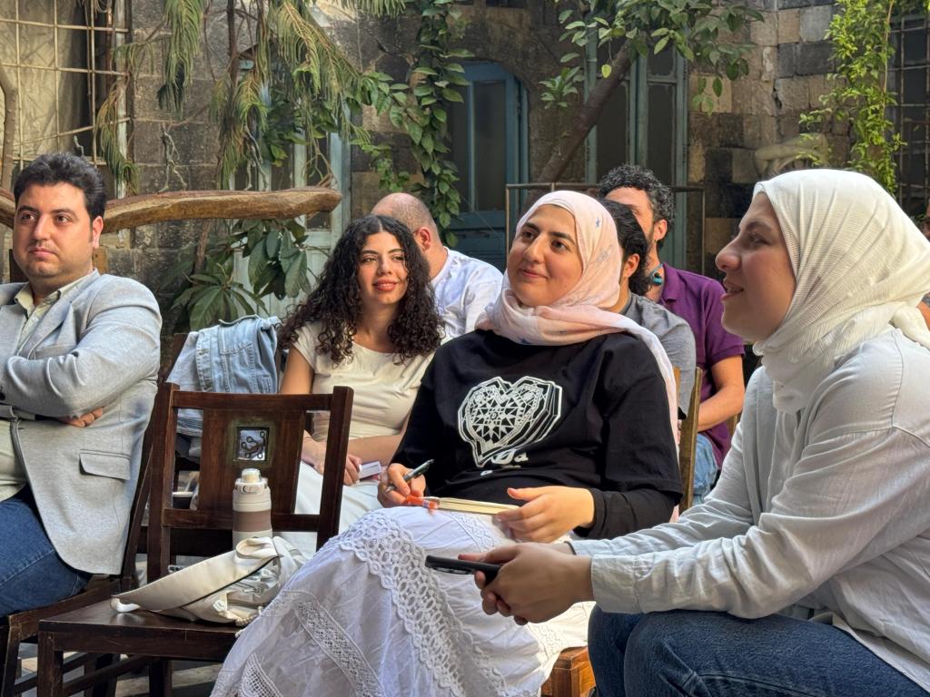 Syrian journalists attend a free media training event in the capital Damascus.