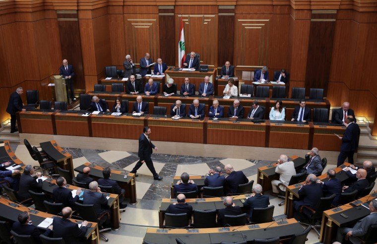 Lebanese Parliament Speaker Nabih Berri and members of the Lebanese government attend a parliament session in Beirut.