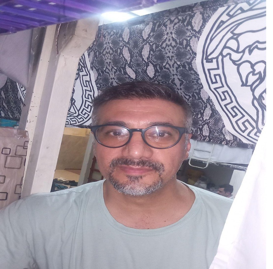 A rare image of Reza Valizadeh, inside Fashafouyeh Prison, where he was held in overcrowded halls alongside inmates convicted of general crimes.