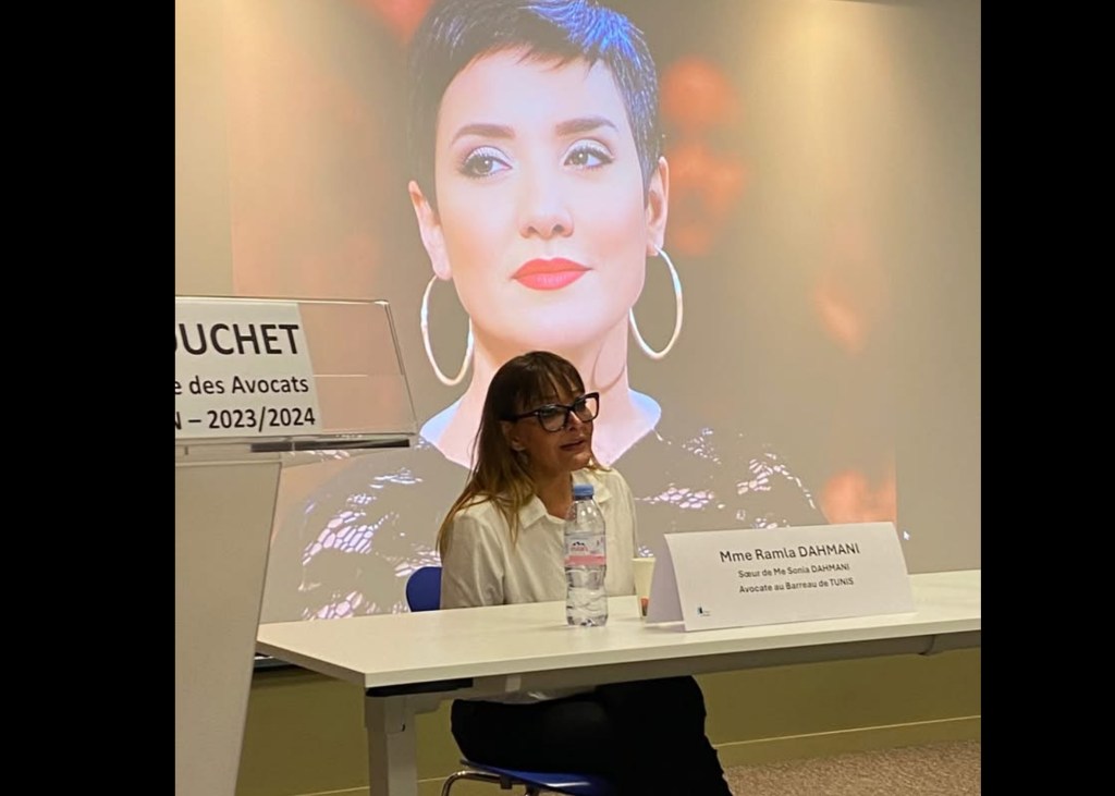 Ramla Dahmani speaks on behalf of her sister, imprisoned Tunisian commentator Sonia Dahmani, who was named an honorary member of the Rouen Bar Association during a conference in Rouen, France.