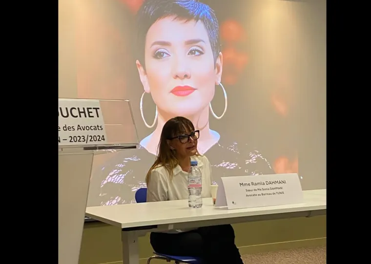 Ramla Dahmani speaks on behalf of her sister, imprisoned Tunisian commentator Sonia Dahmani, who was named an honorary member of the Rouen Bar Association during a conference in Rouen, France.