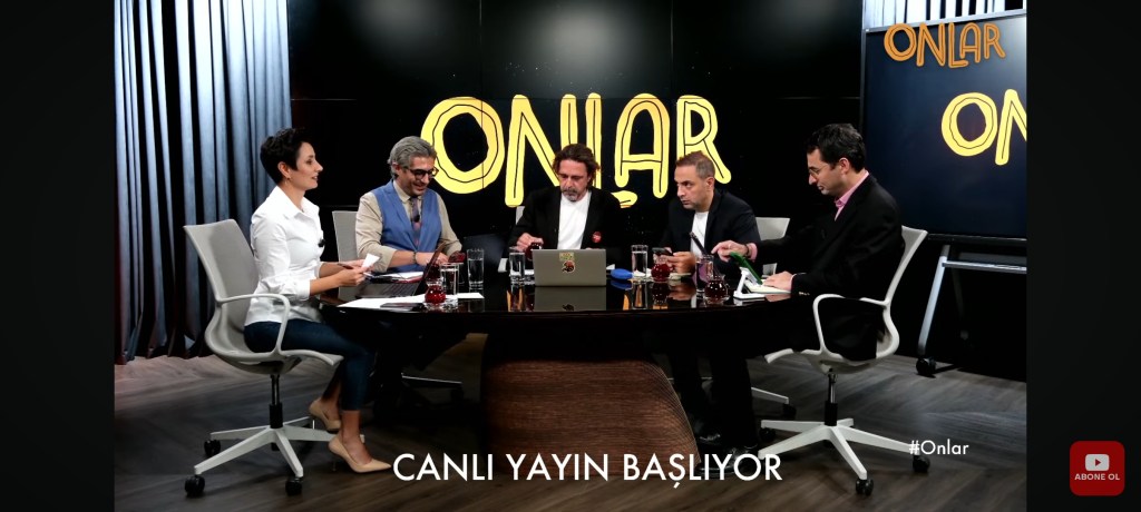 Şule Aydın, left, a host for Onlar TV, said in a broadcast that another host had received a warning about plans of a physical attack on herself and her fellow host Murat Ağırel, second from right.