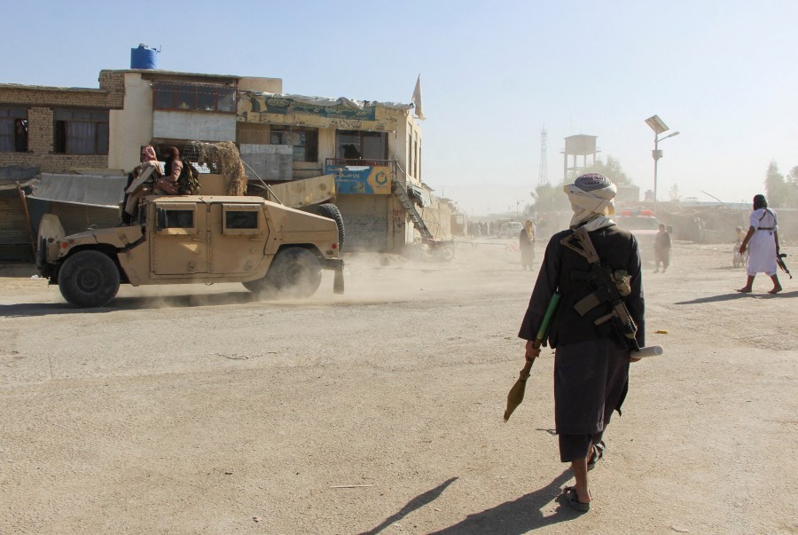Afghan Taliban fighters patrol near the Afghanistan-Pakistan border in Spin Boldak, Kandahar Province, following exchanges of fire between Pakistani and Afghan forces in Afghanistan, October 15, 2025.