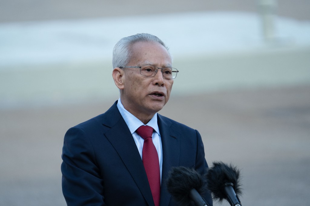 Macau Chief Executive Sam Hou Fai speaks to media at the Macau International Airport after China's President Xi Jinping departed from the city on December 20, 2024. (Photo AFP/Justin Chan)
