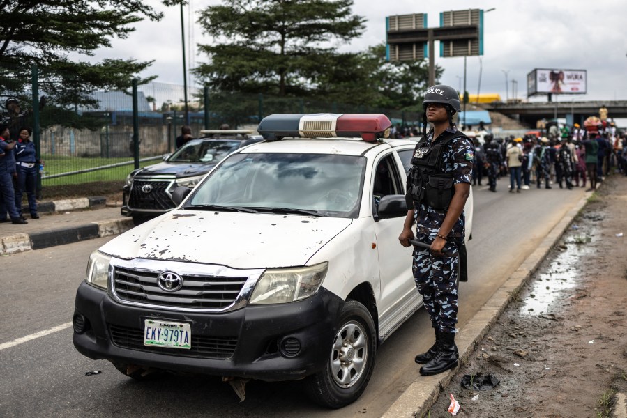 A Nigerian police officer stands guard in Lagos in 2024.