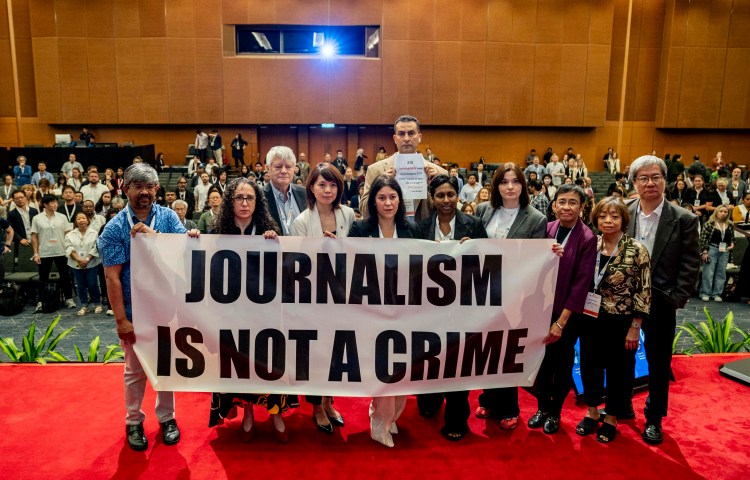 CPJ leads a solidarity action at the Global Investigative Journalism Conference in Kuala Lumpur, Malaysia on November 21, 2025 calling on governments to free imprisoned journalists and end impunity for those who attack the press.