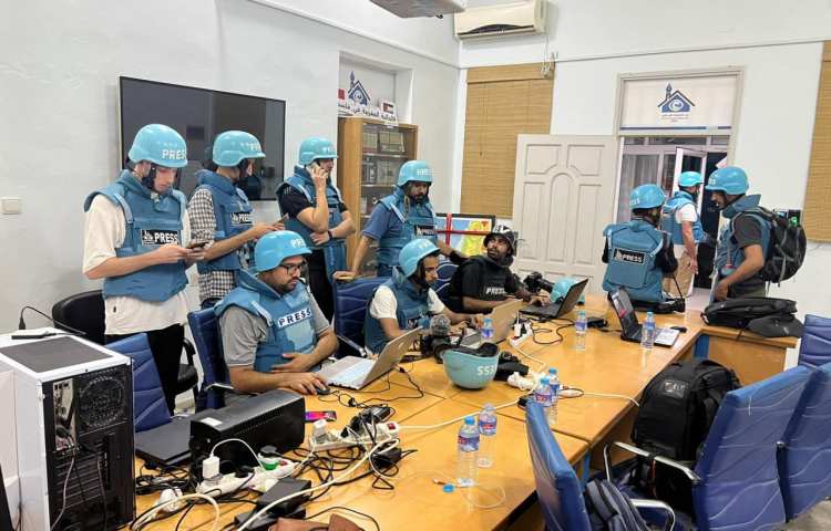 Journalists inside the Press House headquarters in Gaza City during the last war.