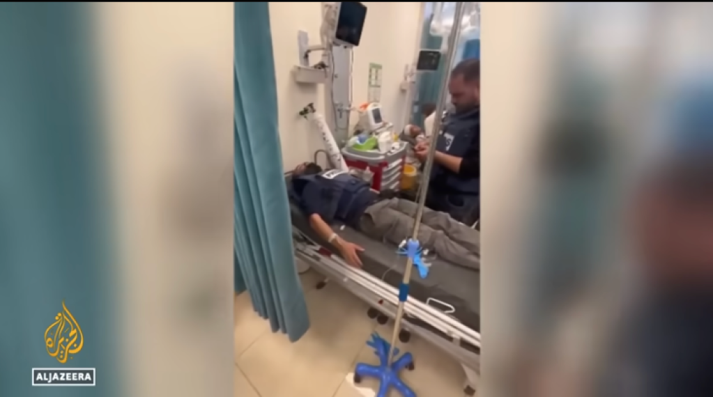 A journalist receives medical care after being attacked by settlers near Nablus in the West Bank on November 8, 2025.