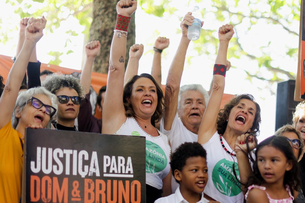 Relatives, friends and Alessandra Sampaio, widow of British journalist Dom Phillips, take part in a demonstration one year after Phillips and Brazilian Indigenous issues expert, Bruno Pereira, were killed in the Amazon, in Copacabana beach in Rio de Janeiro, Brazil June 5, 2023. REUTERS/Pilar Olivares