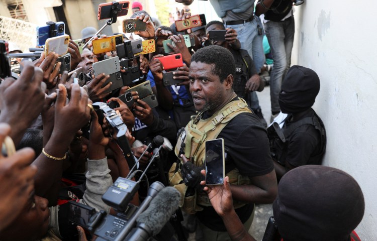 Former police officer Jimmy "Barbecue" Cherizier, leader of the 'G9' gang alliance, speaks during a press conference in Delmas 6, Port-au-Prince, Haiti, March 5, 2024. REUTERS/Ralph Tedy Erol