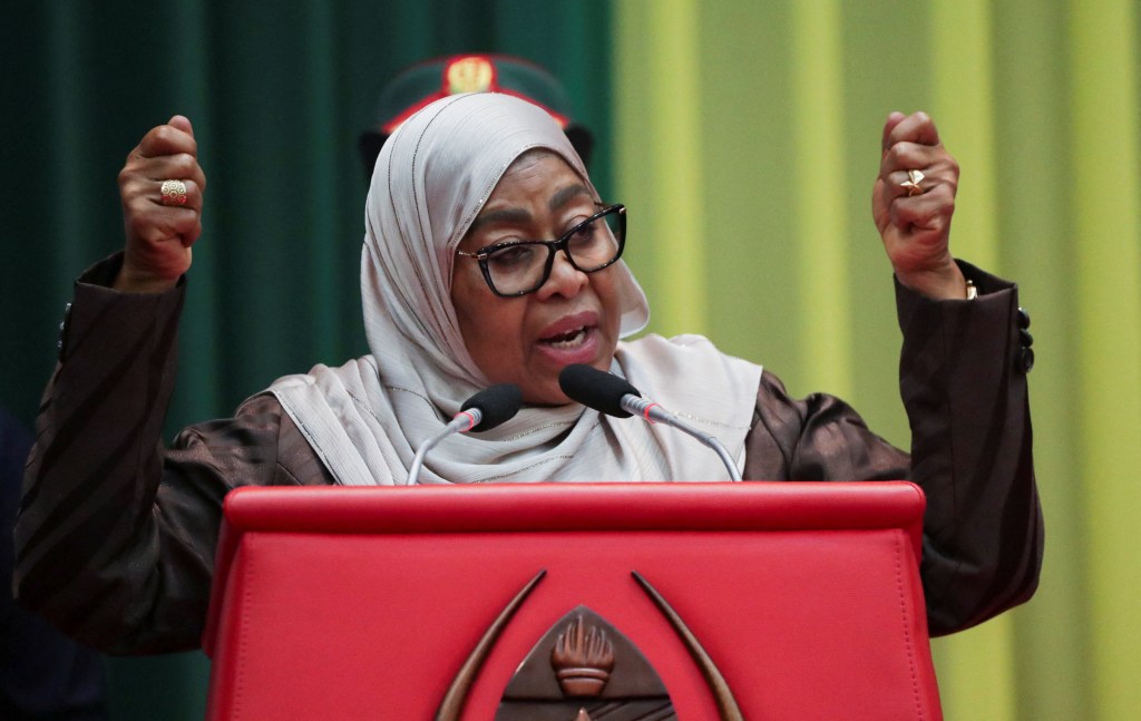 Tanzania's President Samia Suluhu Hassan addresses a meeting as part of efforts to foster peace and national unity following the October 29 general election, in Dar es Salaam on December 2, 2025.