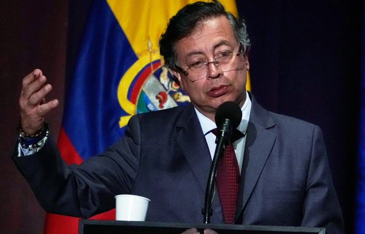 Colombia's President Gustavo Petro speaks at a ceremony marking the ninth anniversary of the signing of a peace deal between the state and the Revolutionary Armed Forces of Colombia (FARC), in Bogota, Colombia, Wednesday, Nov. 26, 2025. (AP Photo/Fernando Vergara)