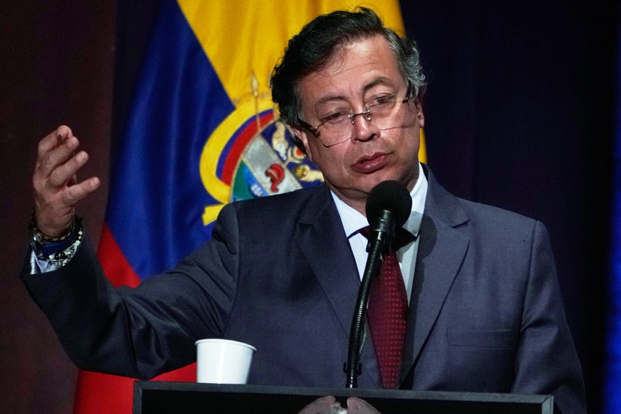 Colombia's President Gustavo Petro speaks at a ceremony marking the ninth anniversary of the signing of a peace deal between the state and the Revolutionary Armed Forces of Colombia (FARC), in Bogota, Colombia, Wednesday, Nov. 26, 2025. (AP Photo/Fernando Vergara)