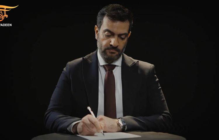 Jordanian journalist Mohammad Faraj is seen presenting a program on Lebanese Al-Mayadeen TV.