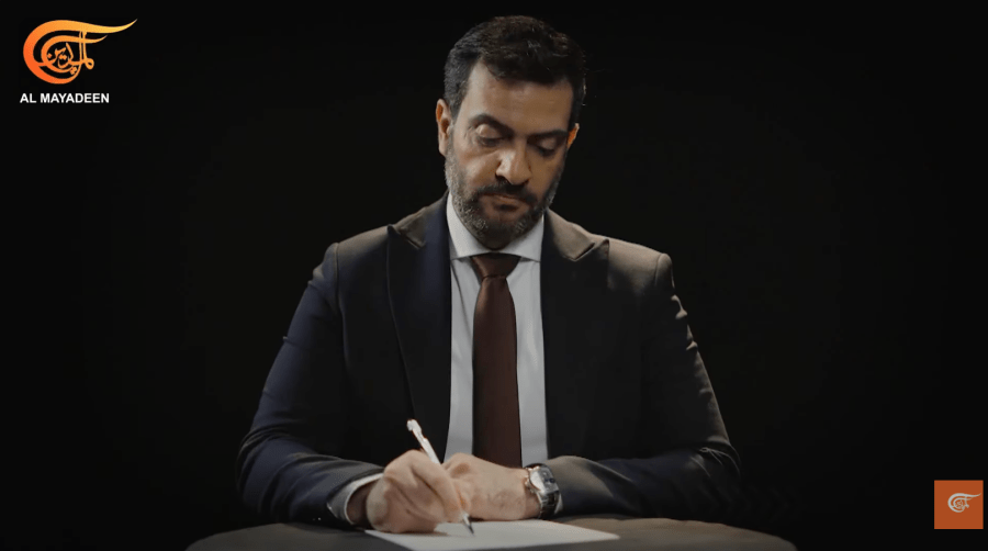 Jordanian journalist Mohammad Faraj is seen presenting a program on Lebanese Al-Mayadeen TV.