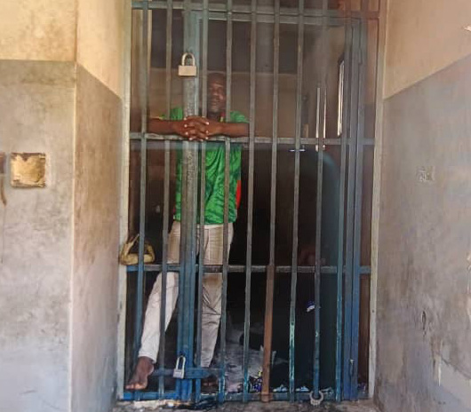 Congolese journalist Ali Male is seen in detention at the prosecutor’s office in the capital, Kinshasa.