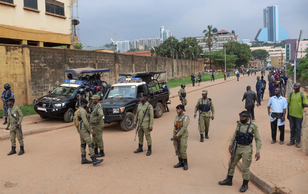 Ugandan police officers secure a Kampala street on January 12.
