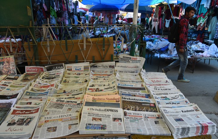 Newspapers on sale at a stall in Srinagar, Jammu and Kashmir.