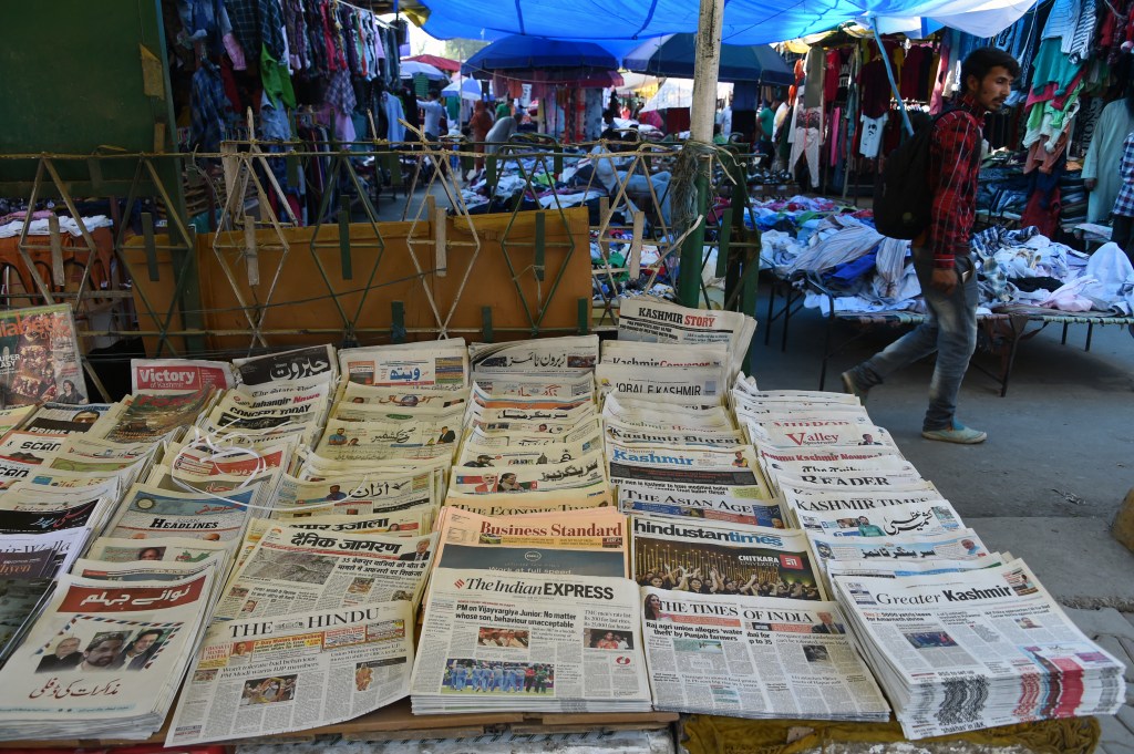 Newspapers on sale at a stall in Srinagar, Jammu and Kashmir.