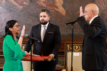 Vice President Delcy Rodriguez is being sworn-in as Venezuela's interim president by National Assembly President Jorge Rodriguez, after the U.S. launched a strike on the country and captured President Nicolas Maduro and his wife Cilia Flores, in Caracas, Venezuela, January 5, 2026. Marcelo Garcia/Miraflores Palace/Handout via REUTERS ATTENTION EDITORS - THIS IMAGE HAS BEEN SUPPLIED BY A THIRD PARTY TPX IMAGES OF THE DAY