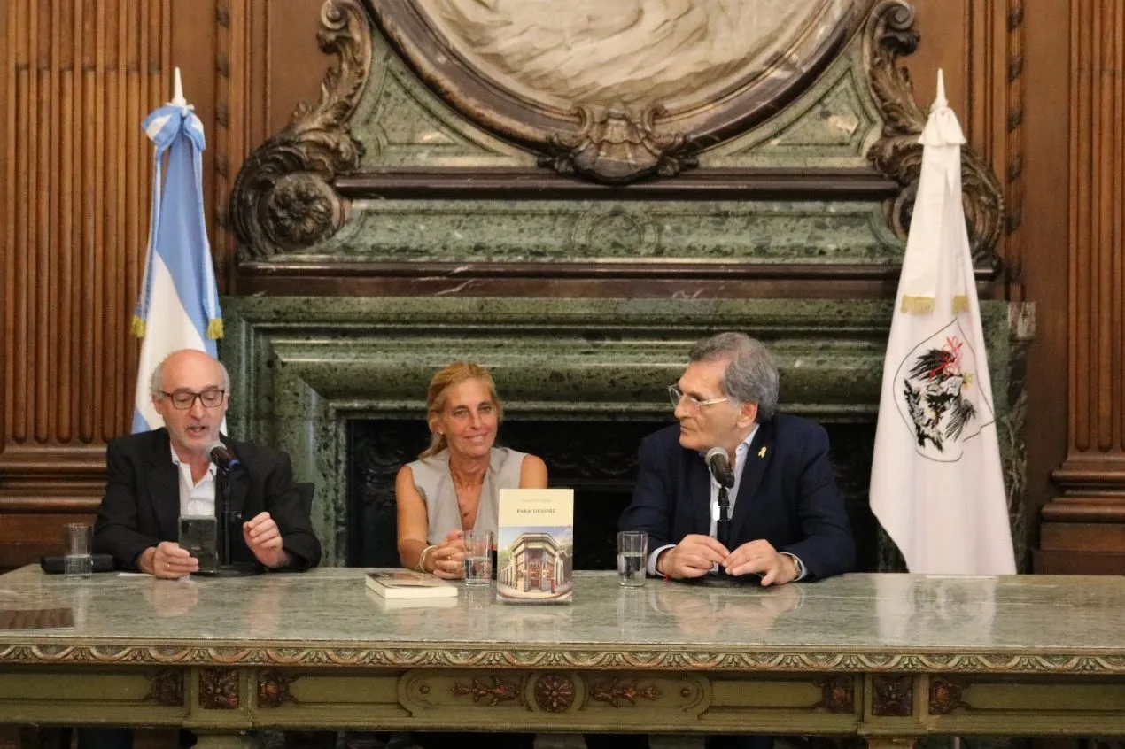 Journalist Alejandro Alfie, from Clarín (left), during writer Claudio Avruj (right) book presentation at the Buenos Aires City Council in December 2025
