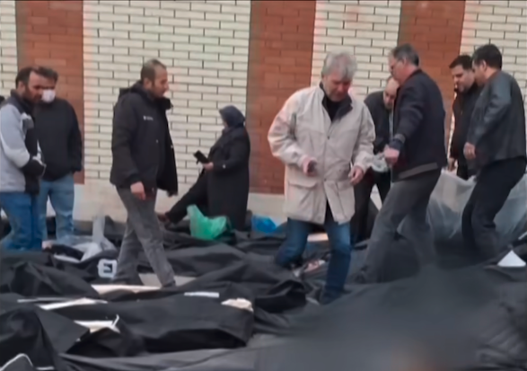 Iranians searching for their loved ones among dozens of bodies.