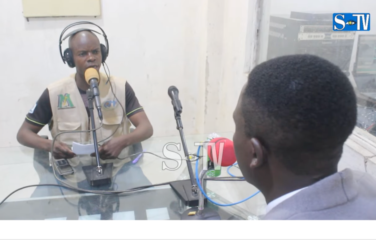 Thomson Unji Batangalwa interviews a local leader about security on Radio Le Messager du Peuple, days after rebels took over the eastern city of Uvira in December. When the government retook the city in January, police detained the journalist.