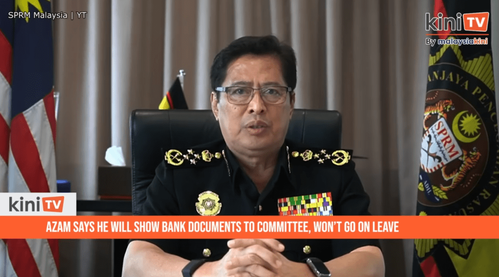 Malaysian anti-corruption chief Azam Baki appears at a news conference about a government investigation into his alleged breach of shareholding laws.