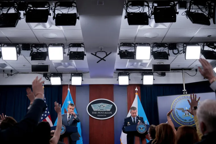 U.S. Secretary of Defense Pete Hegseth and Chairman of the Joint Chiefs of Staff General Dan Caine hold a briefing amid the U.S.-Israeli war on Iran, at the Pentagon in Washington, D.C., U.S., March 19, 2026. REUTERS/Evan Vucci TPX IMAGES OF THE DAY