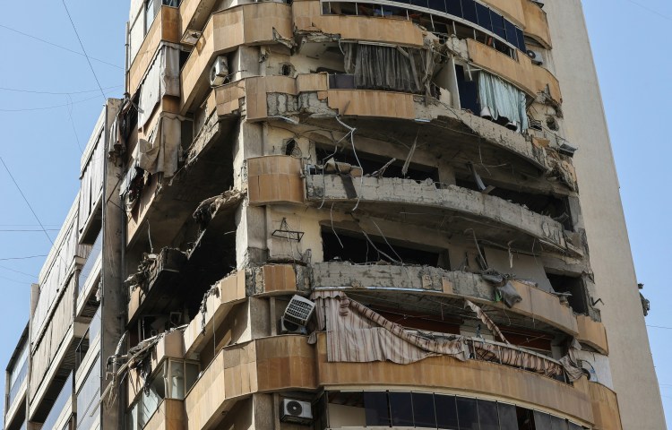 A photograph shows the damage in the aftermath of an Israeli airstrike that targeted an apartment in central Beirut's Zuqaq al-Blat neighbourhood on March 18, 2026.