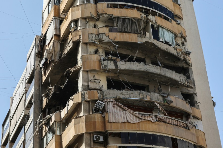A photograph shows the damage in the aftermath of an Israeli airstrike that targeted an apartment in central Beirut's Zuqaq al-Blat neighbourhood on March 18, 2026.
