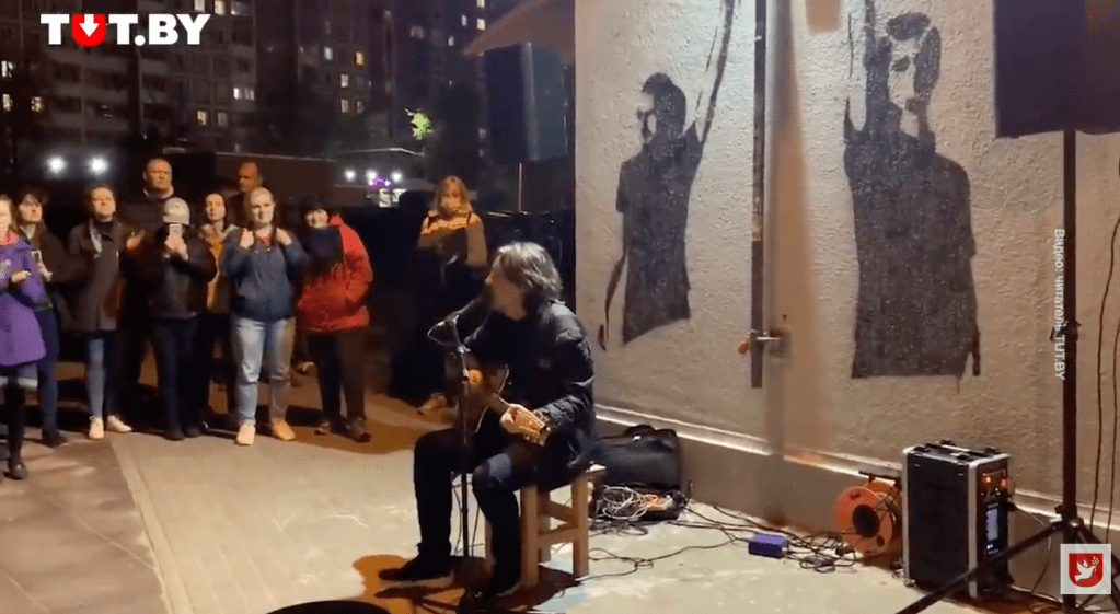 Musician and radio host Aleh Khamenka performs on a Minsk street in 2020 amid nationwide protests demanding the resignation of the Belarusian president. A court has sentenced him to three years in jail on "extremism" charges over his work with Belarusian Radio Racyja.